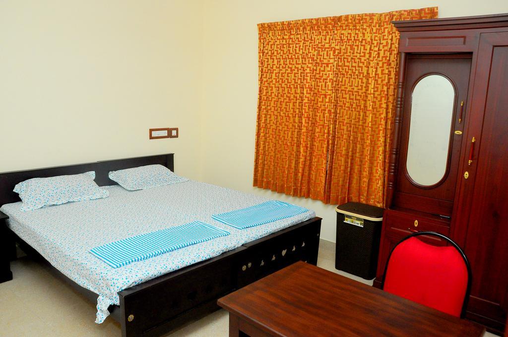 Grace Guest Home Thrissur Værelse billede